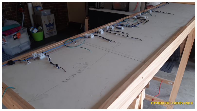THe wiring completed on the underside of the layout board - April 29, 2021